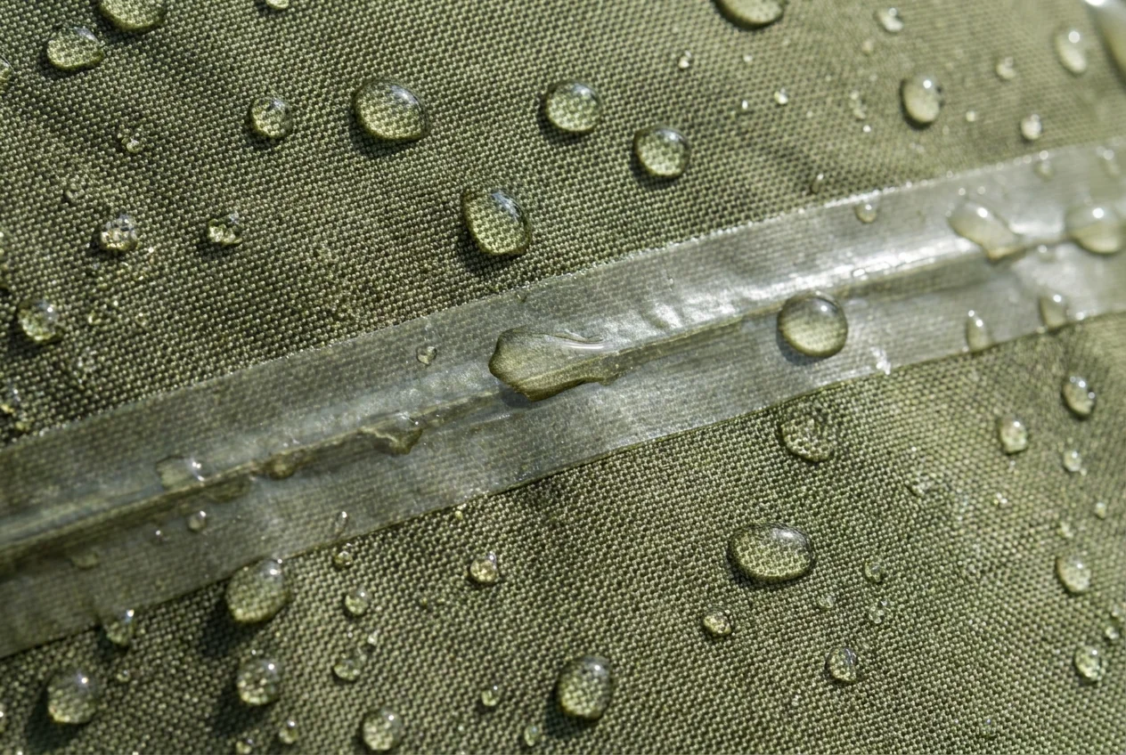 Waterproof laminate membrane fabric layers