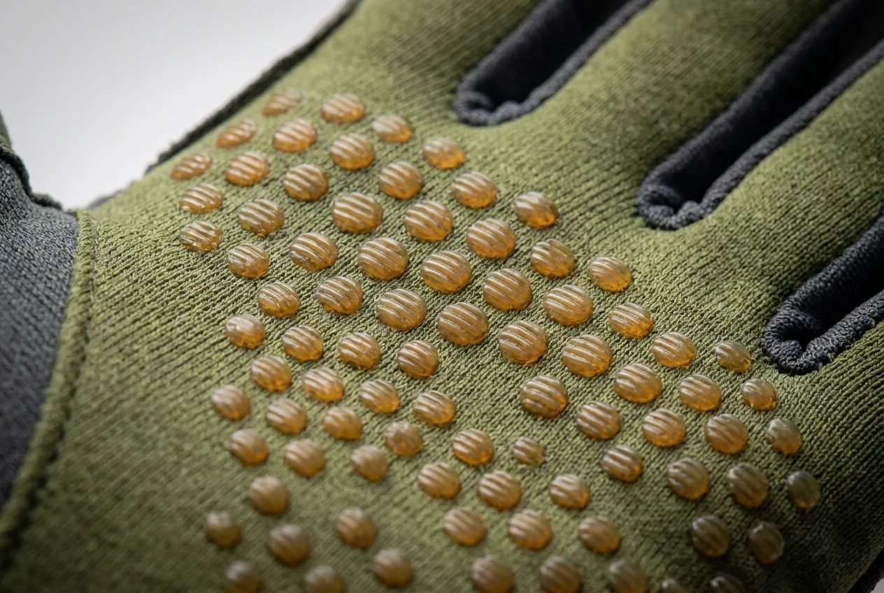 Silicone-print palm grip detail on custom fishing glove